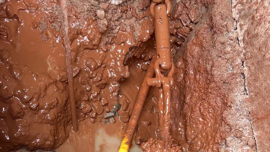HDPE pipe pullback through a bore pit on a Dallas directional boring job